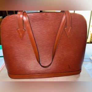 Louis Vuitton Lussac Epi Leather. COA provided. VI0916.